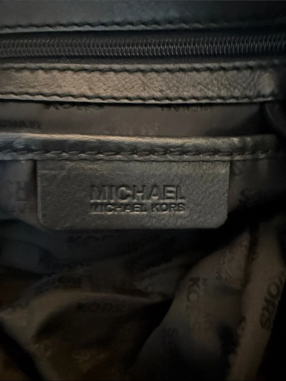 Michael Kors Black Leather Shoulder Bag with Braided Handles and Tassel